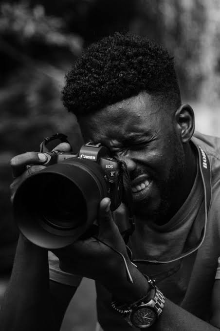 Photographer capturing a portrait
